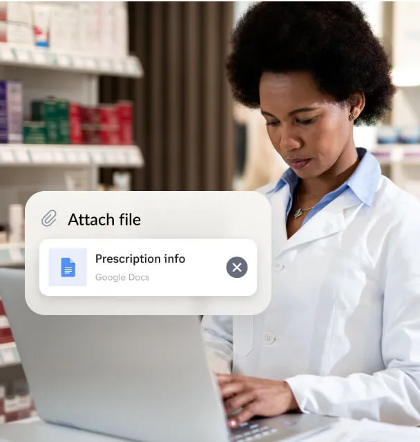 A female pharmacist attaching a prescription file sent via RingCentral Fax