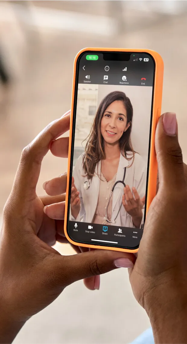 A female doctor in a video conference consultation with a patient using the RingCentral mobile app