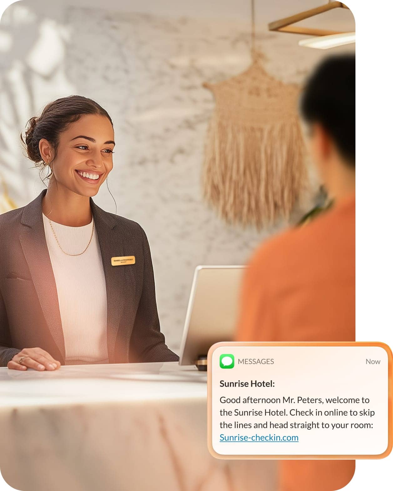 A hotel receptionist is checking in a guest with an inset of the RingCentral SMS feature.