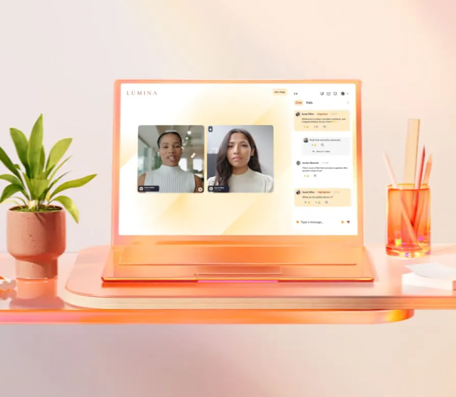 A sleek orange laptop featuring a RingCentral Event