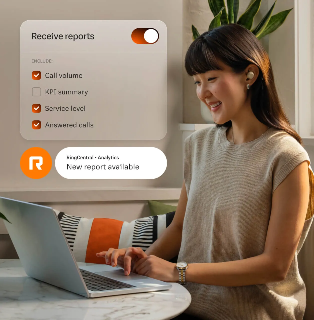 A woman receiving an analytics report of Call Volume, Service Level, and Answered calls within the RingCentral app