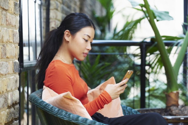 woman texting on mobile phone-773