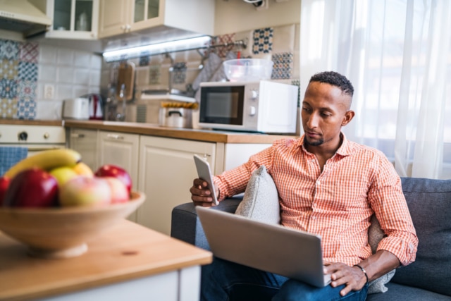 Young man working in his home office-784