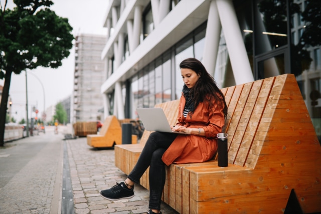 young woman working on the go in Berlin-951