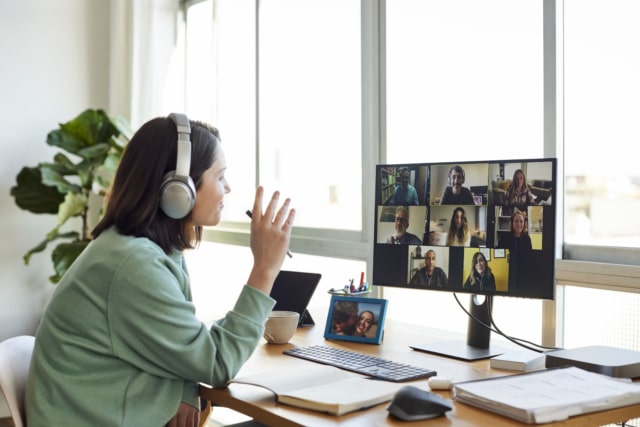 Businesswoman Discussing On Video Call In Home Office-222