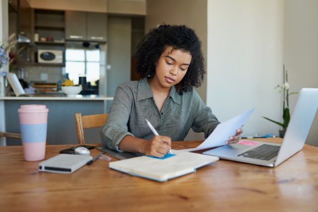 Woman working productively in teleworking mode