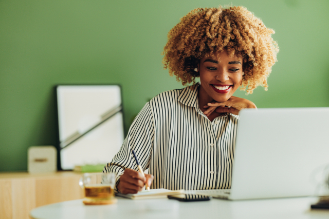 Happy Businesswoman Working at her Office-814