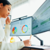 Woman with back pain working at standing desk home office-325