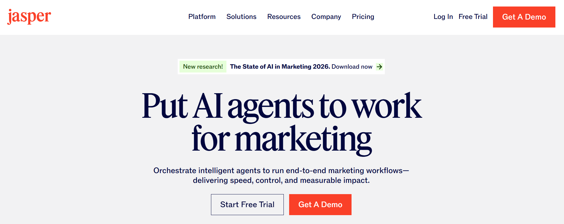 The Jasper homepage with a clean white background and the tagline “Put AI agents to work for marketing”